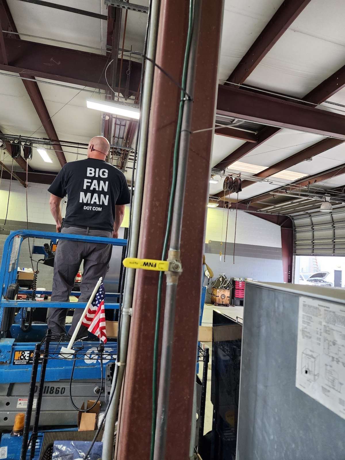 Big Fan Man technician at work